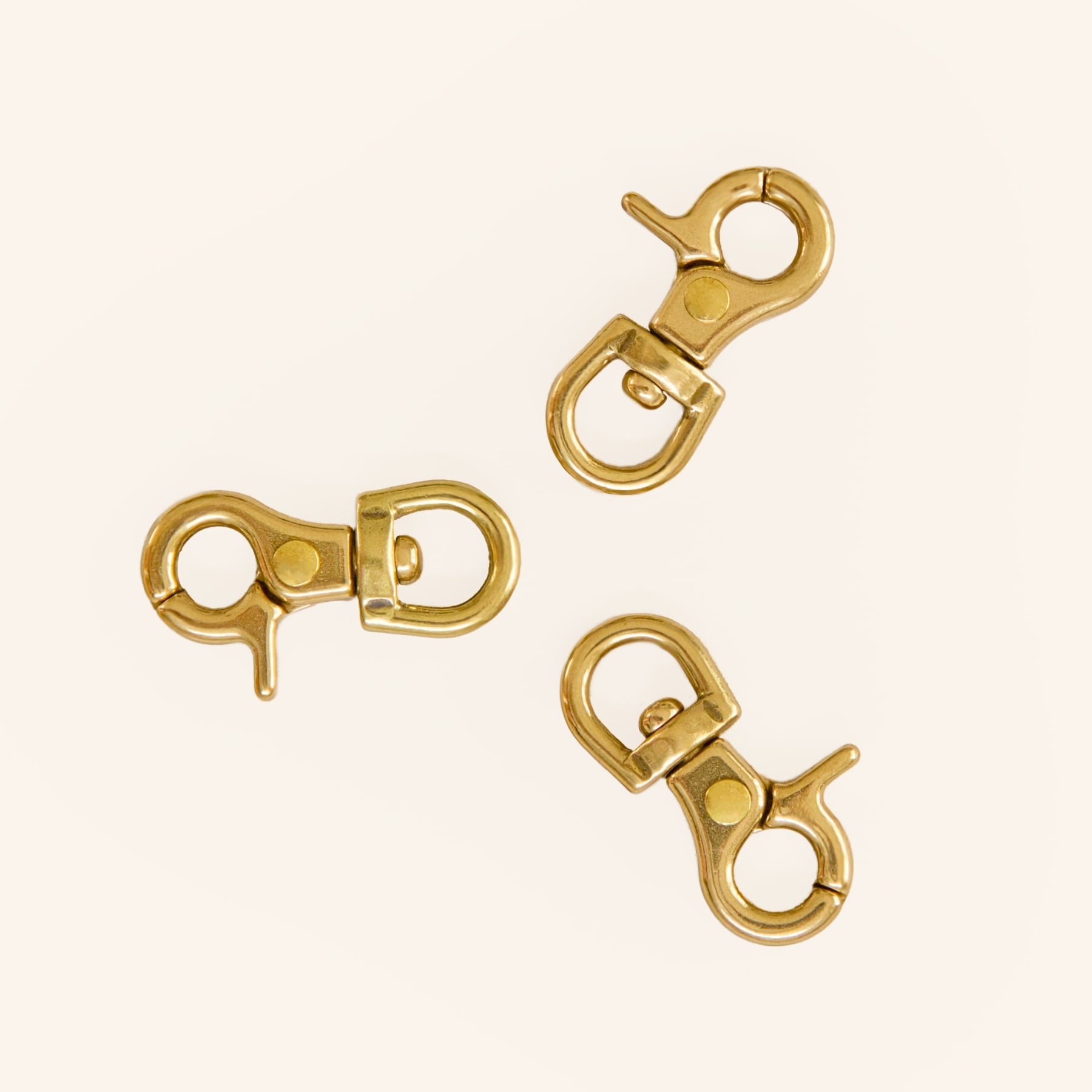 Three solid brass dog tag Quick Clips with swivel snap hook for personalised dog name tags