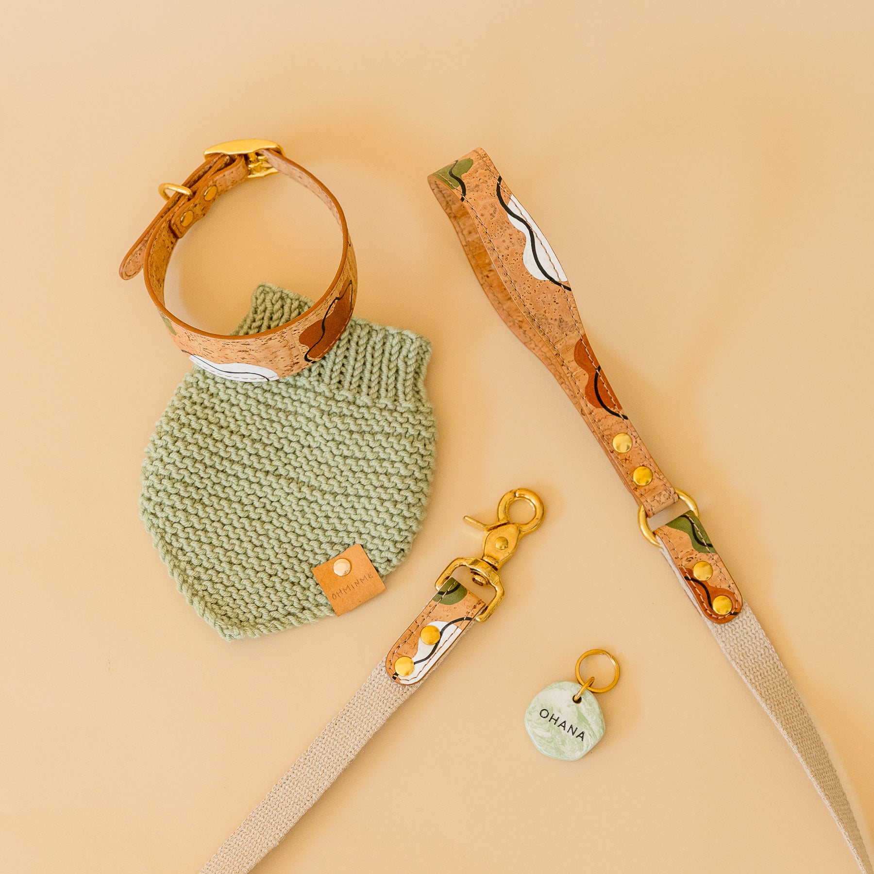 vegan cork leather dog collar and leash set in tan brown color and golden brass hardware, accompanied by a personalised ID tag and wool bandana