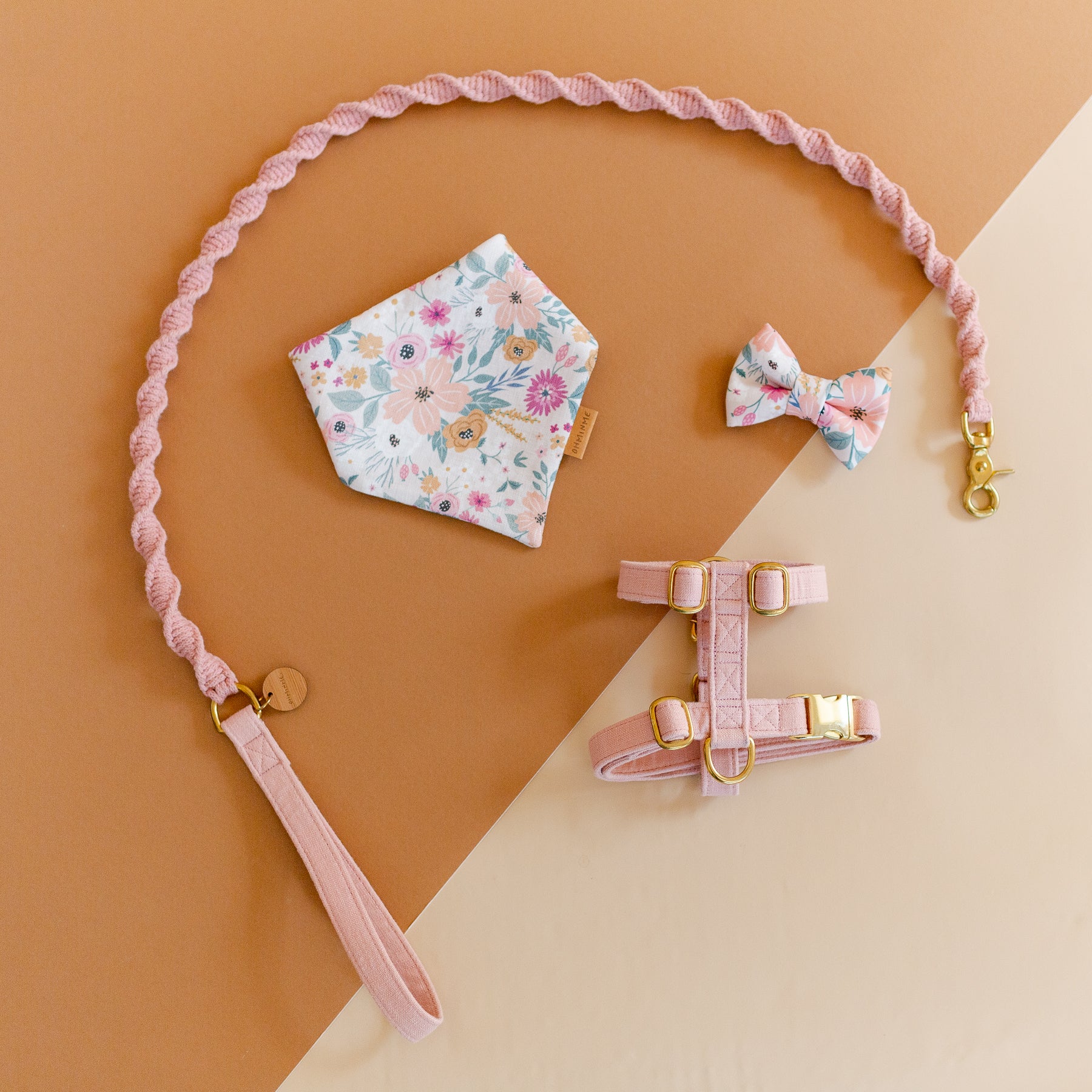 pink macrame dog leash with matching harness, styled with a cotton dog bandana and bow tie in a summer print