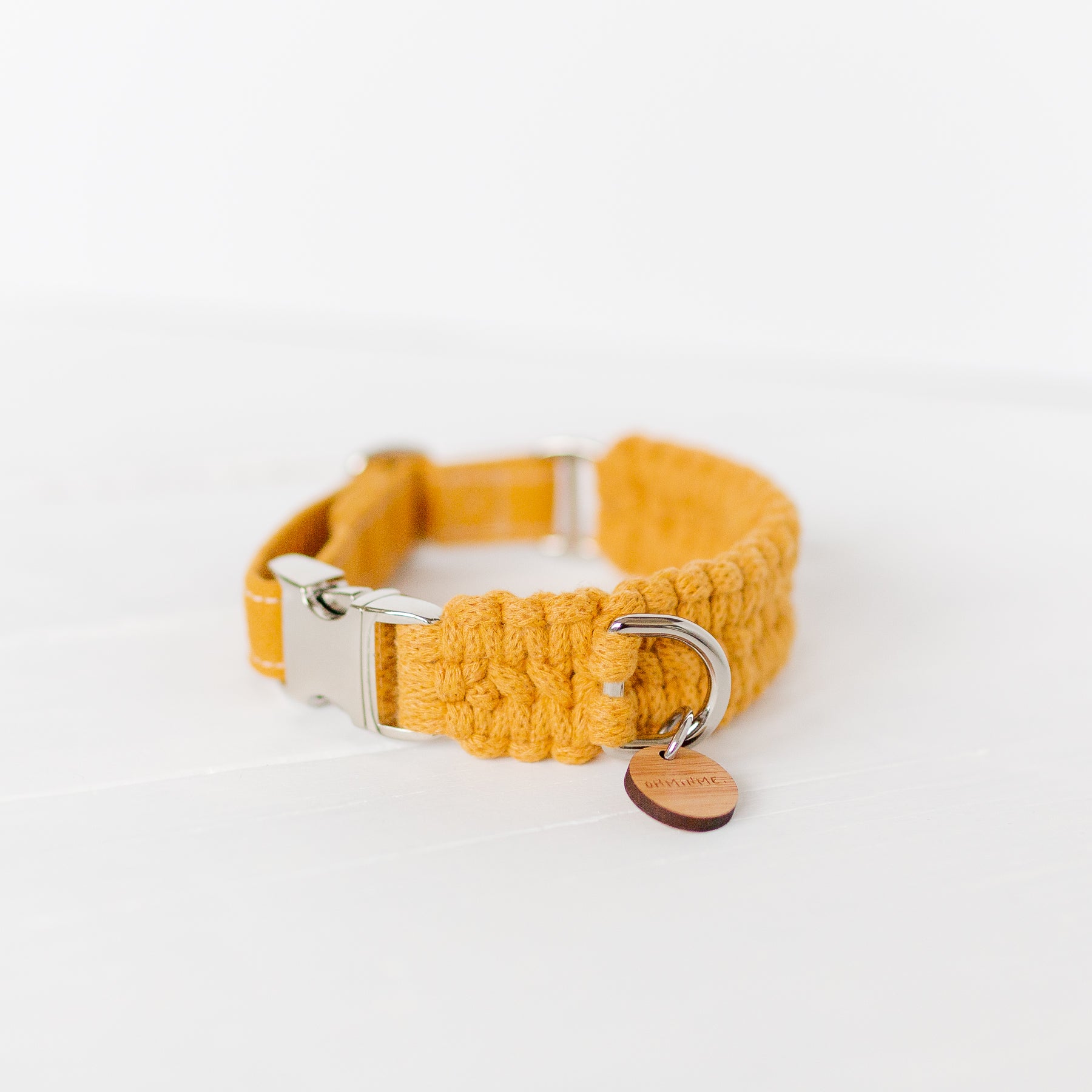 macrame dog collar in mustard yellow with silver hardware and bamboo tag