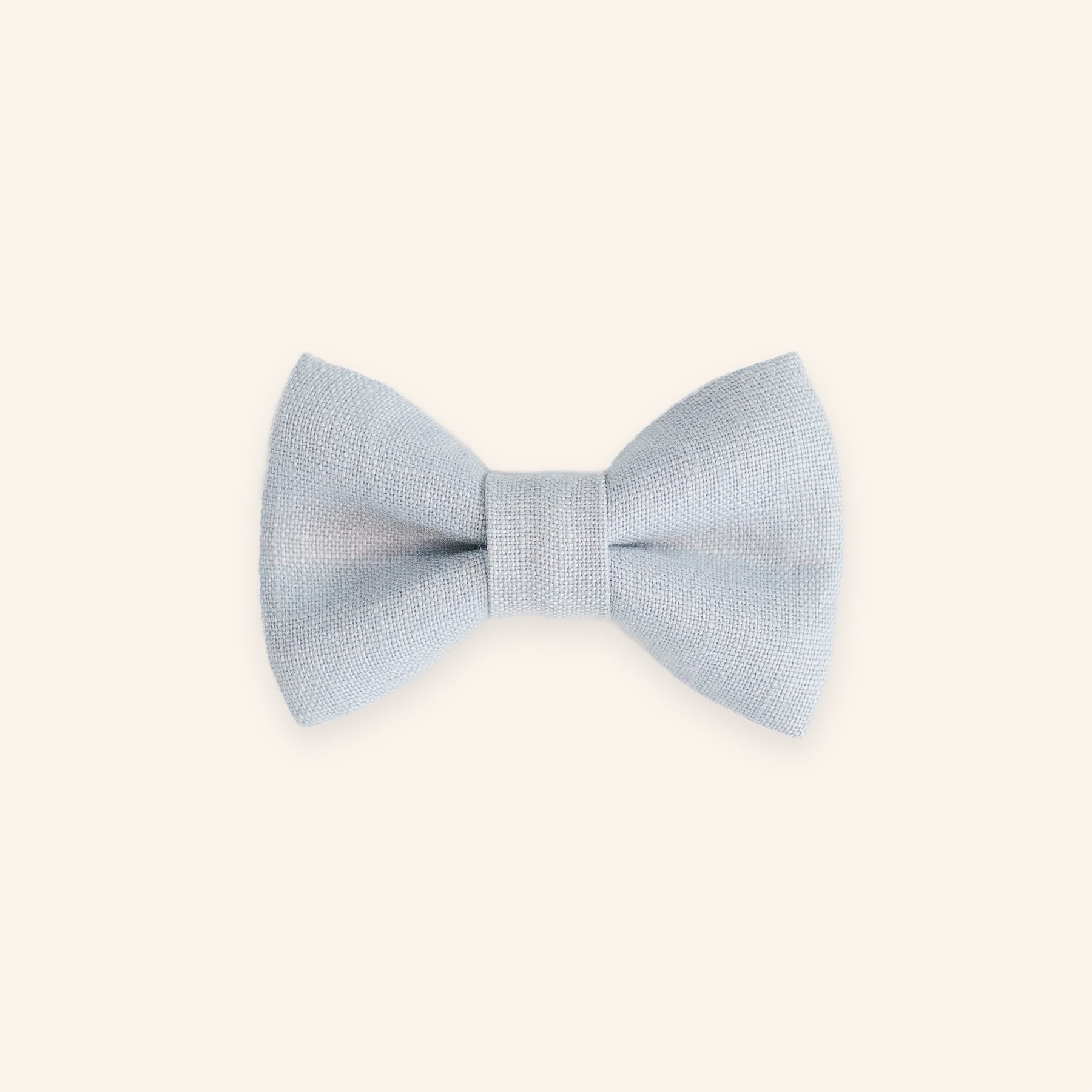 Light blue dog bow tie in linen, front view.